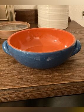 A vintage De Silva handled soup bowl made in Italy from terracotta potter.